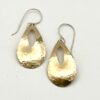 Handcrafted brass teardrop earrings with a hammered finish and Argentium sterling ear wires
